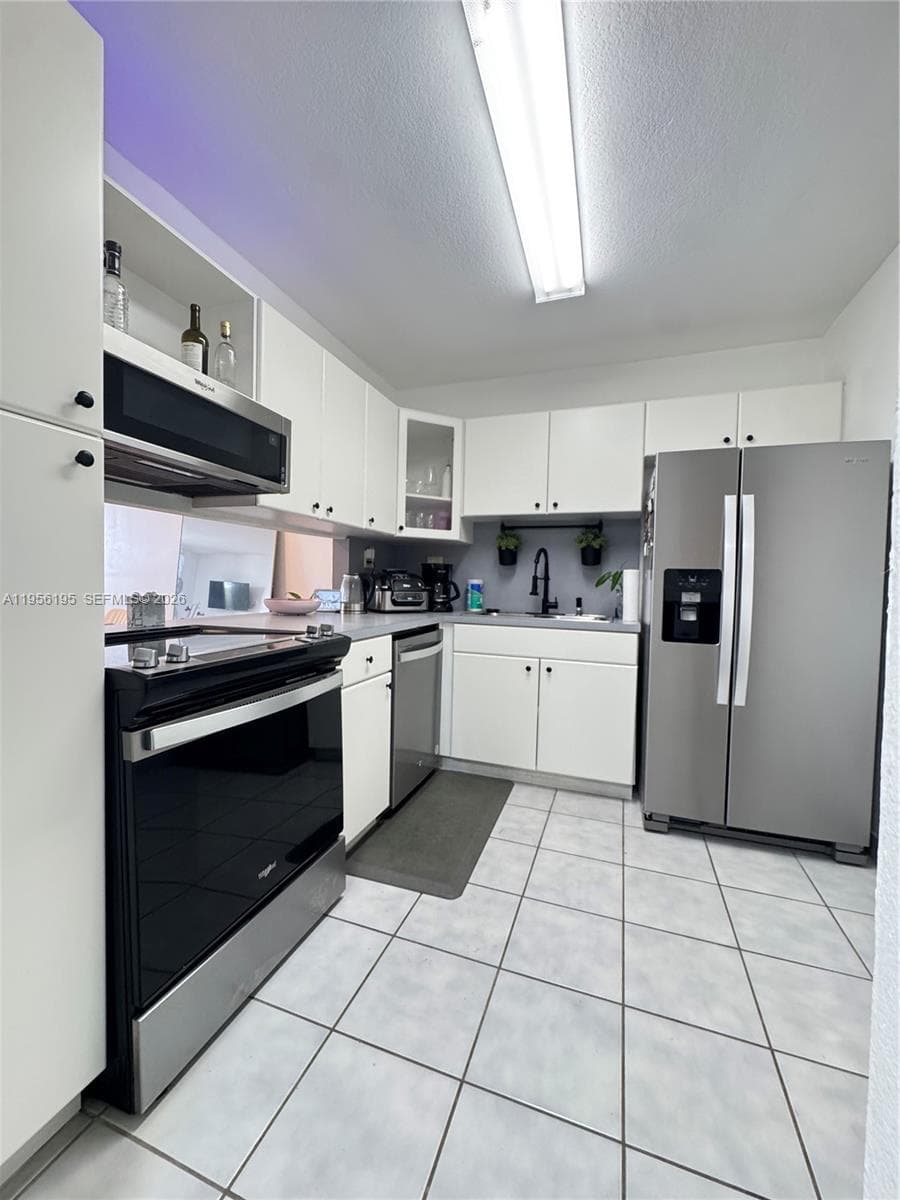 OLYMPUS CONDO PHASE · #119 in Hallandale Beach - Photo 5