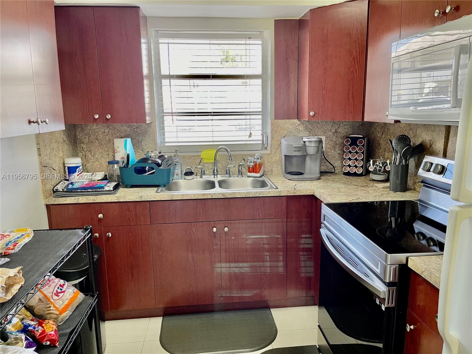VILLAGE AT DADELAND CONDO · #B113 in Miami - Photo 3