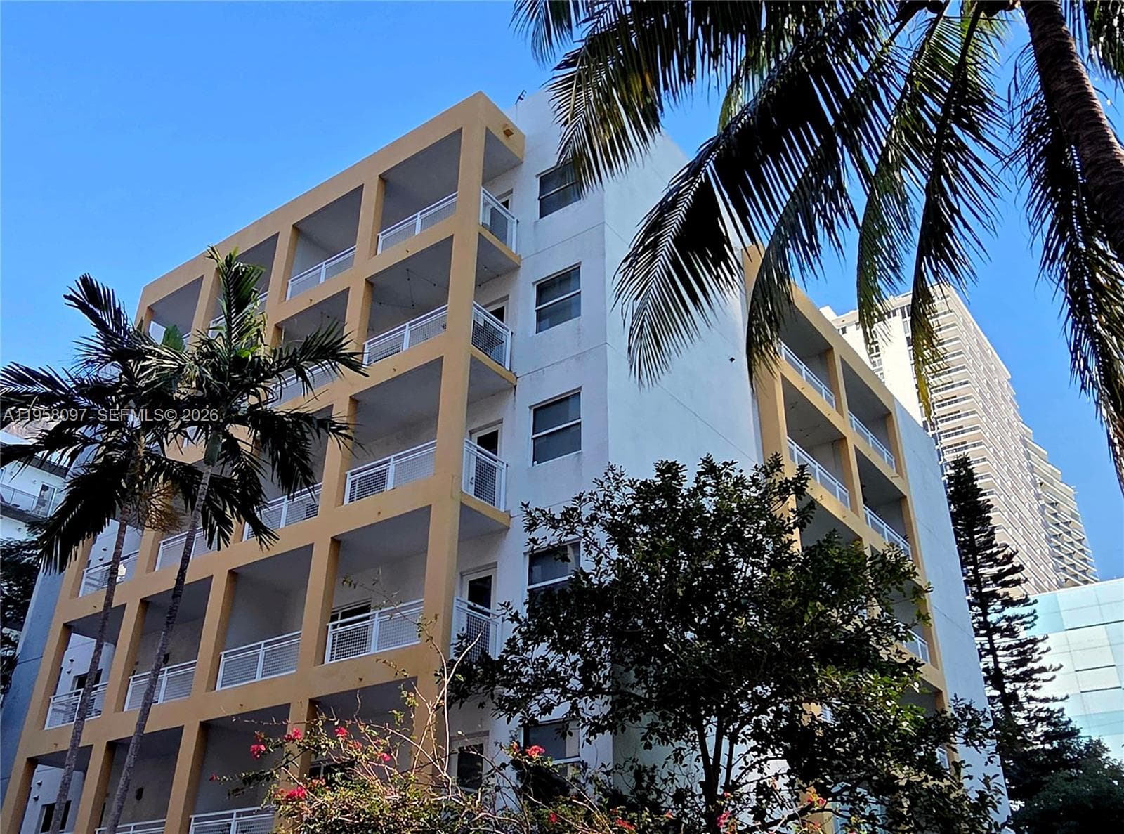 Alternate exterior angle highlighting architectural details and open balcony design.