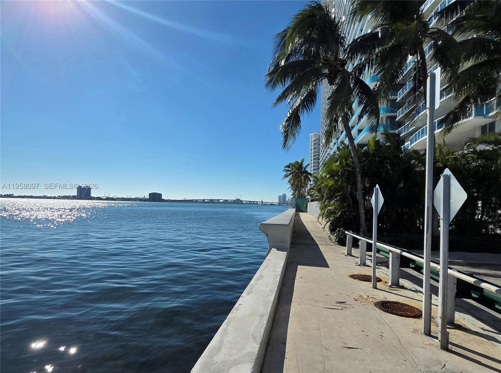 Prime Edgewater location near Biscayne Boulevard surrounded by modern high-rise residences and palm-lined streets.