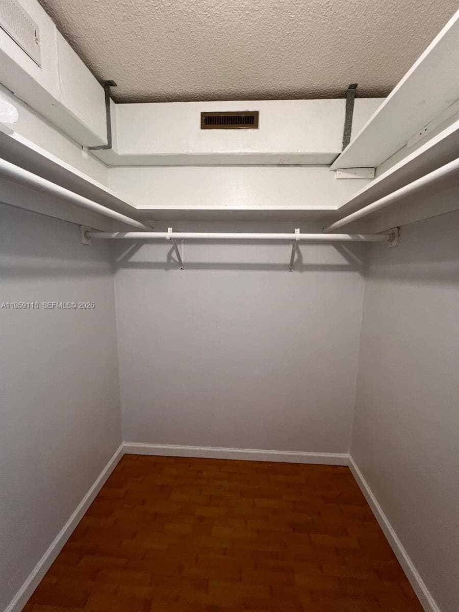 Principal Bedroom walk-in closet