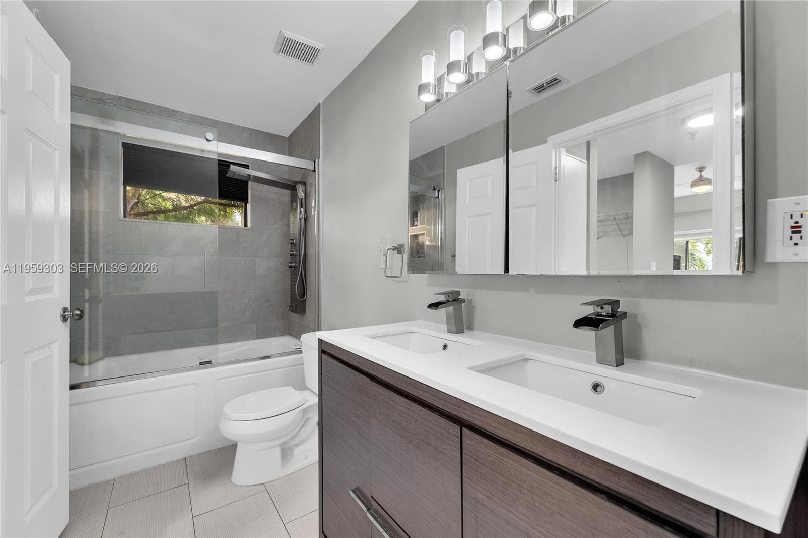 Dual sinks are a bonus. Has storage shelves for toiletries and linen closet.