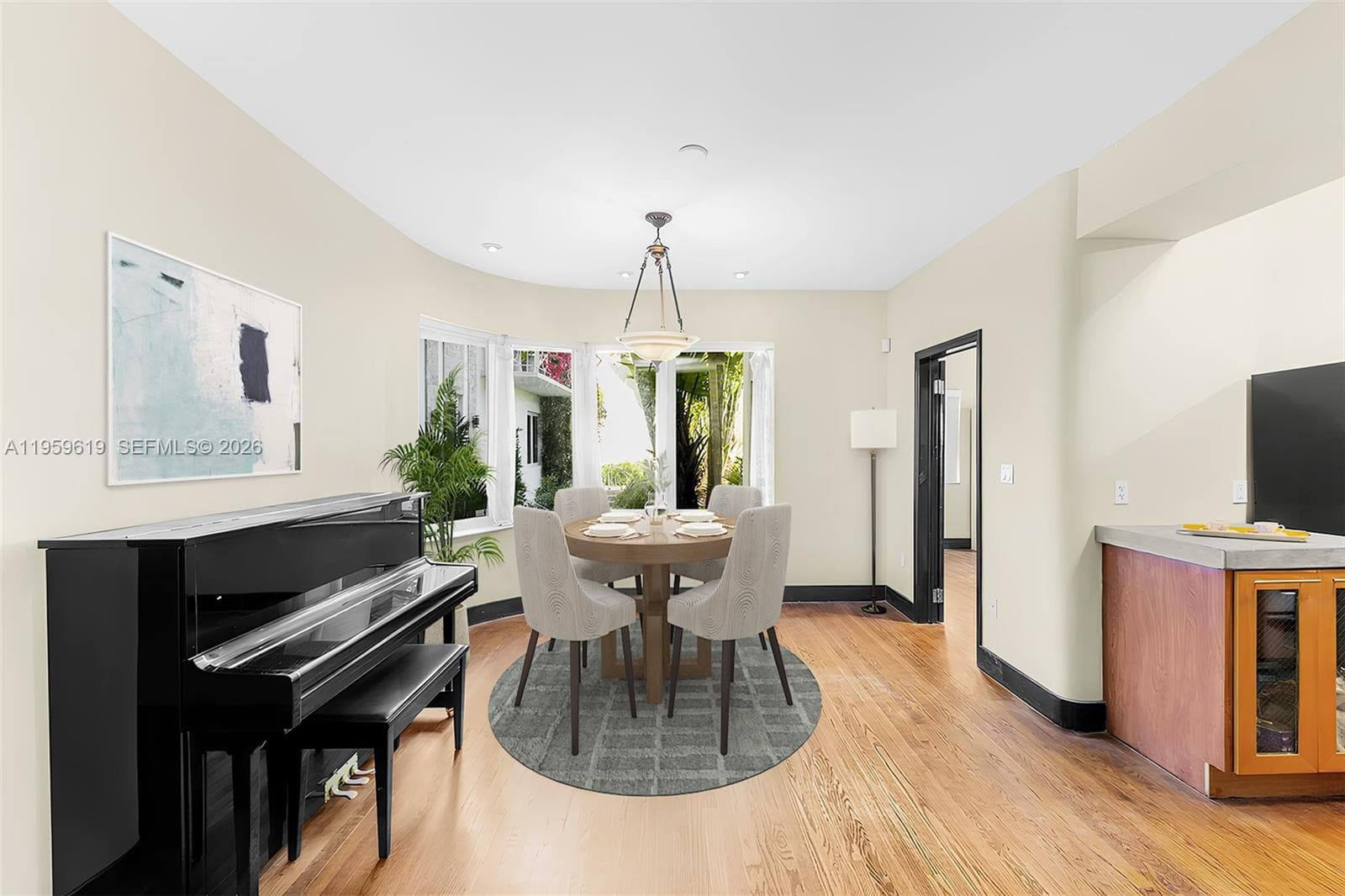 Dining area with classic curvilinear windows