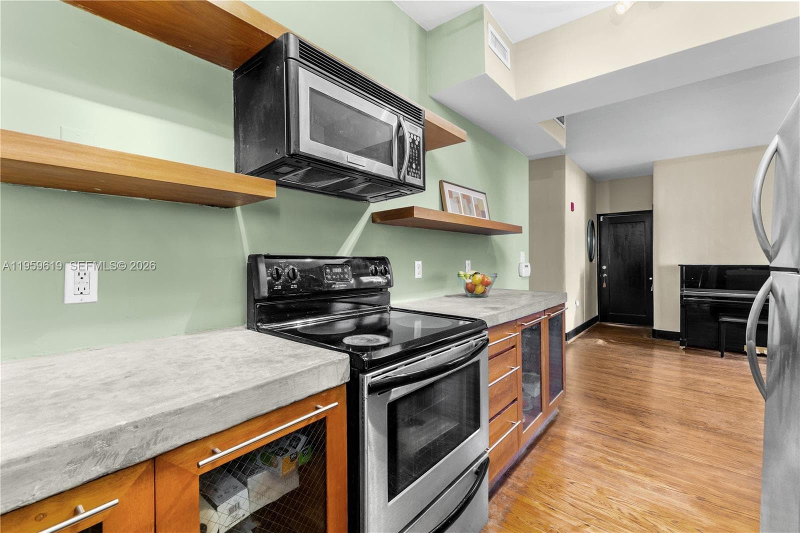 Sleek kitchen with full size appliances