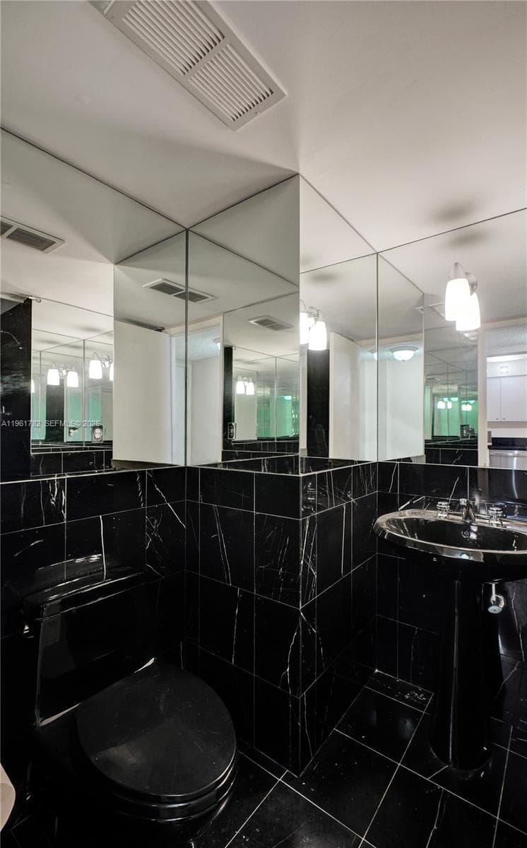 Black marble-2nd full bathroom
