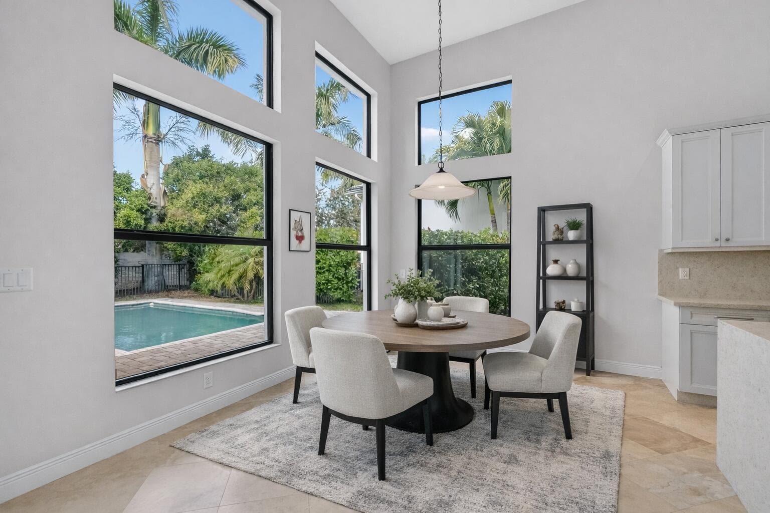 Bright breakfast nook with tropical view