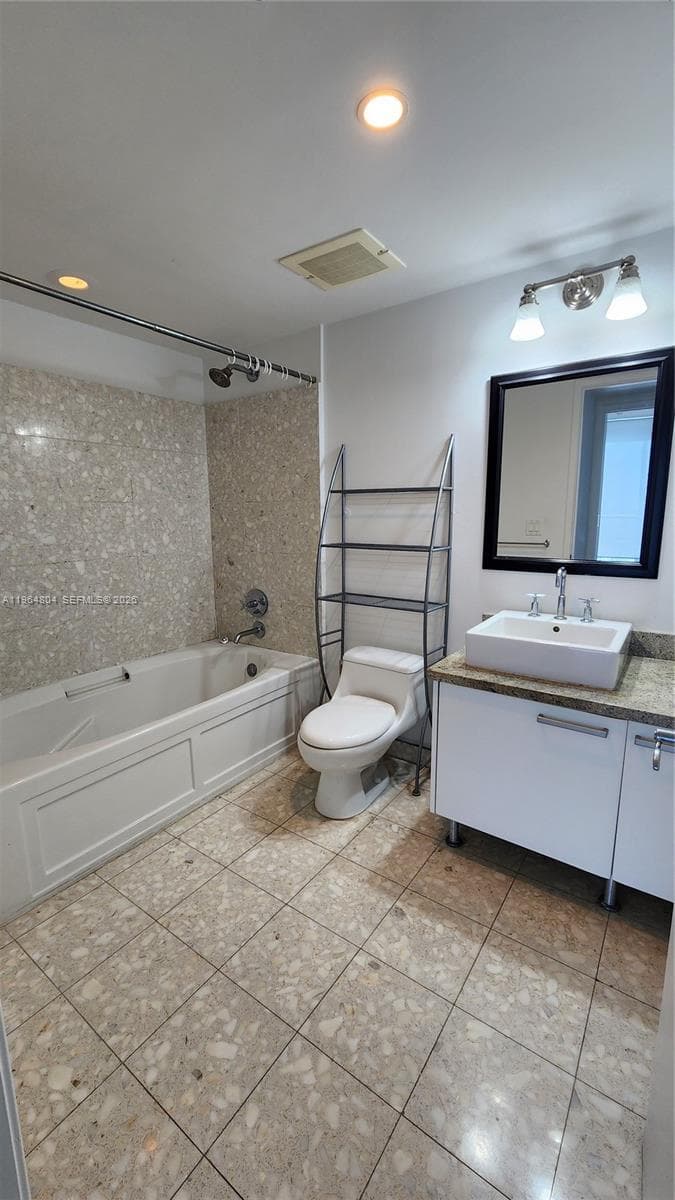 Beautiful and modern bathroom. The marble flooring gives it a stylish and modern aesthetic.