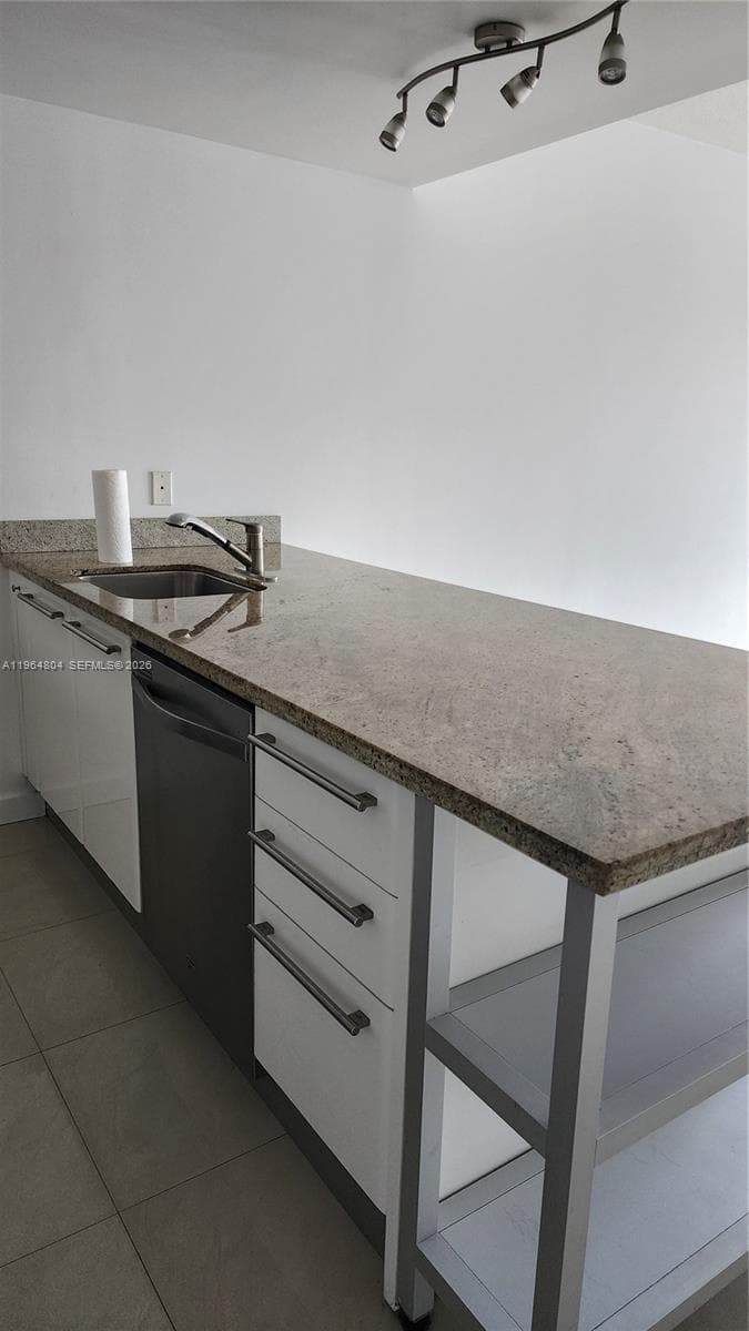 Stainless steel appliances, granite countertop. Modern and elegant