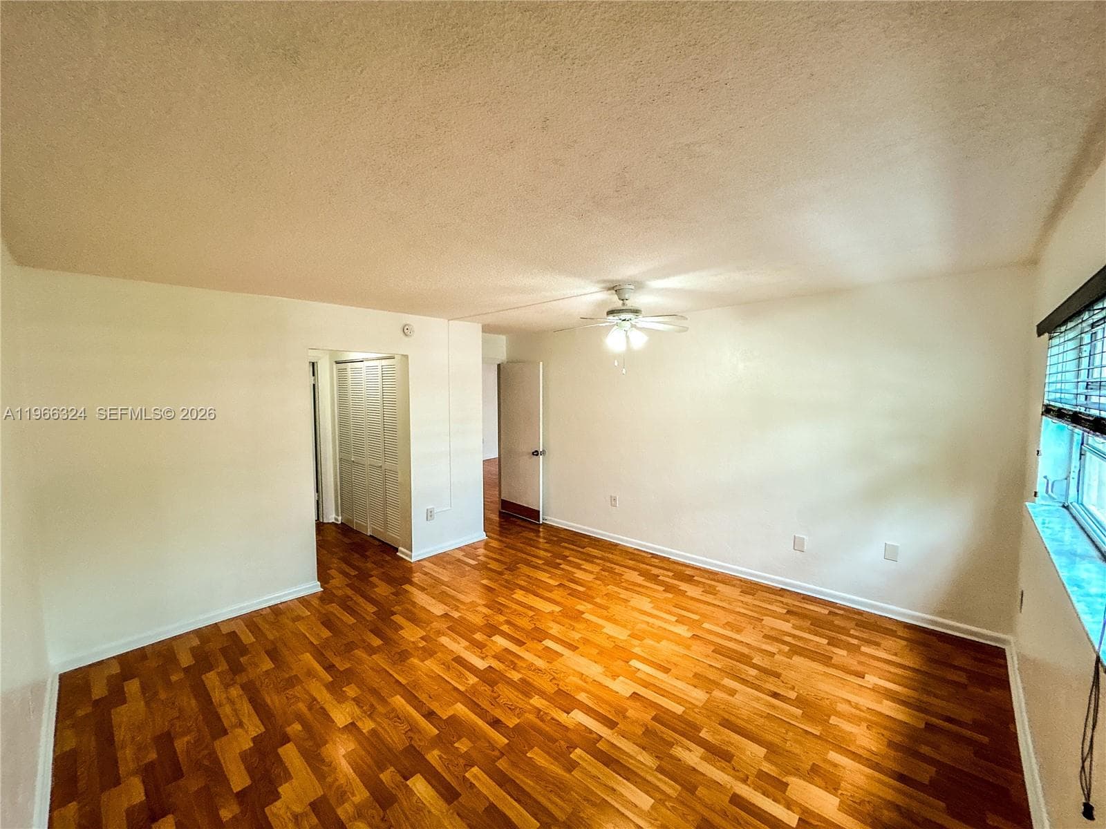 walk in closet and hallway closet in bedroom