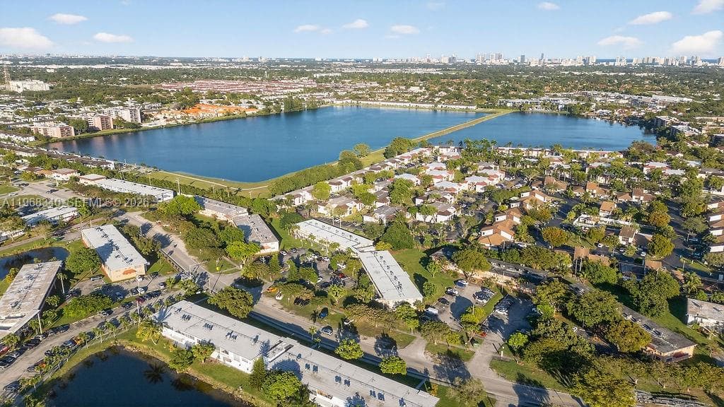 Aerial view of the Ro-Mont South community, highlighting building placement, landscaped grounds, and proximity to surrounding amenities.