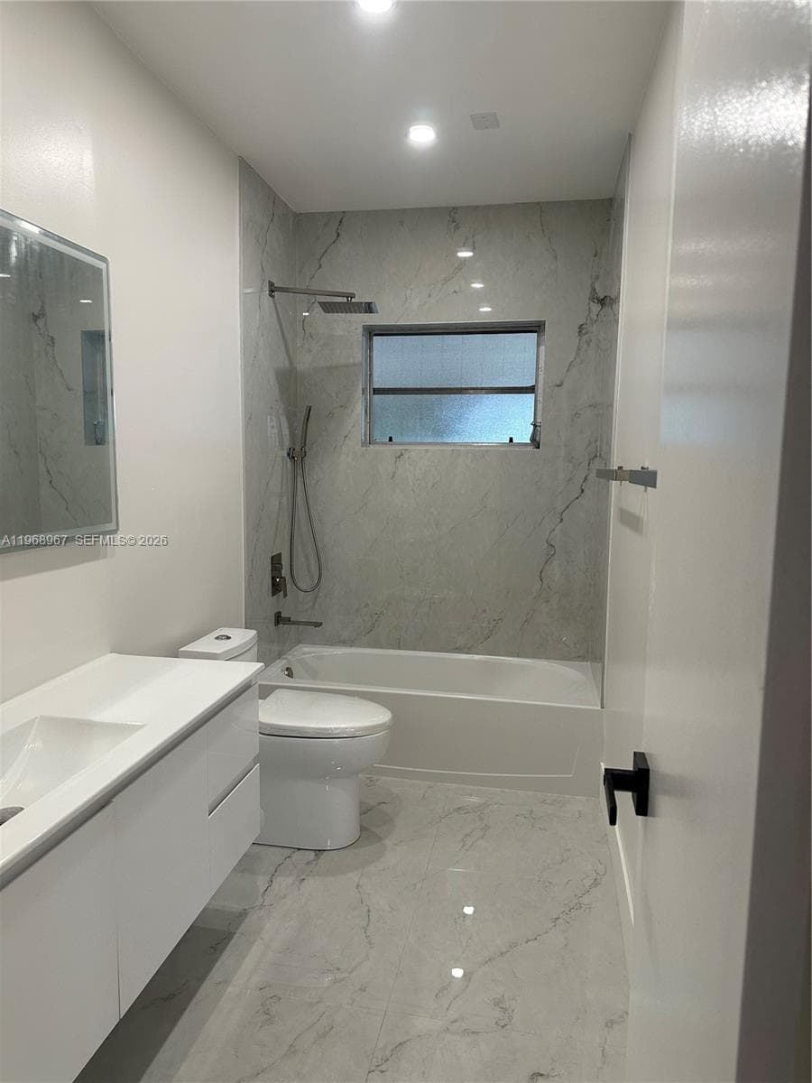 Shared bathroom with tub