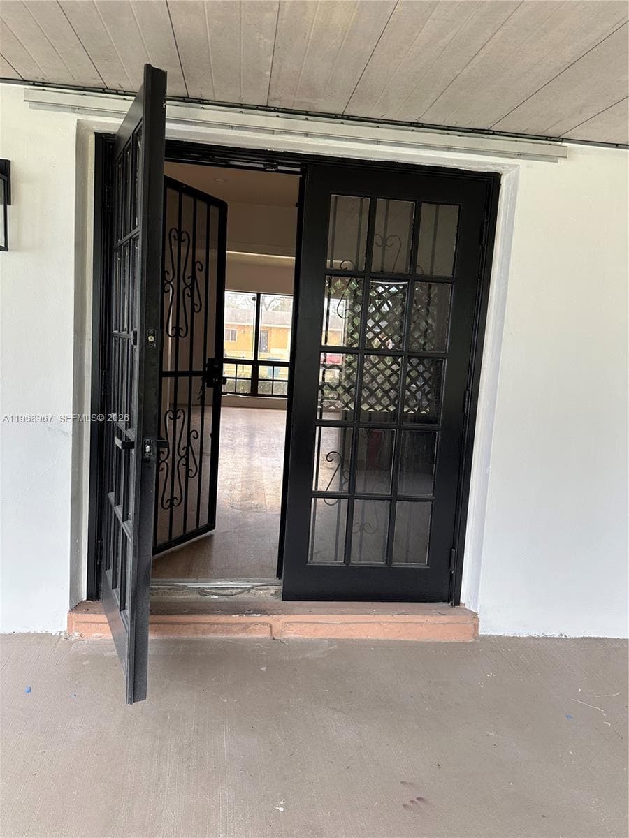 Exit to back door/rear entry to house