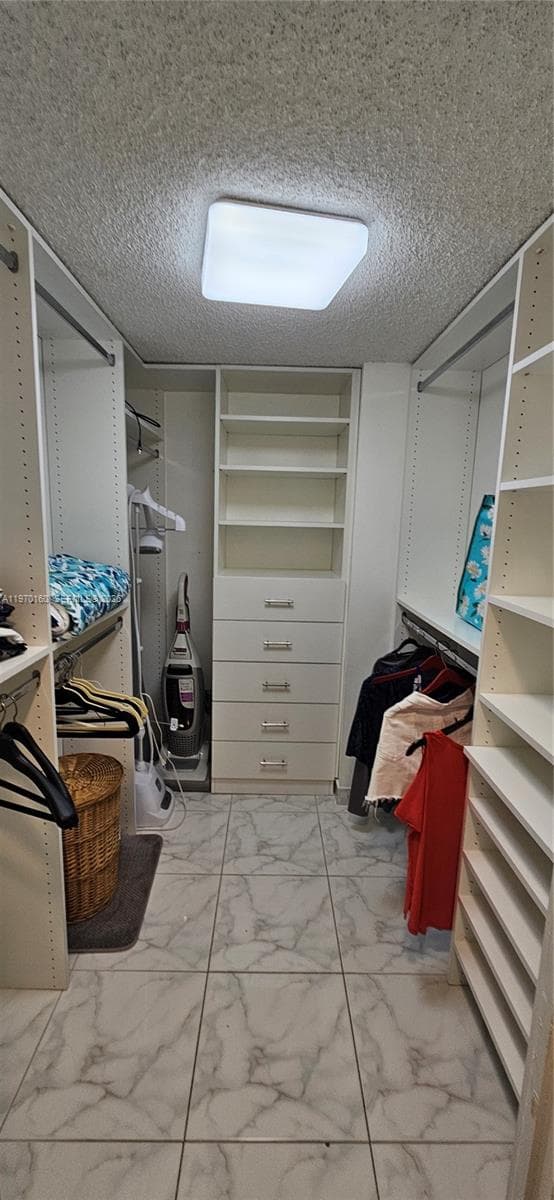 MAIN WALK- IN CLOSET
