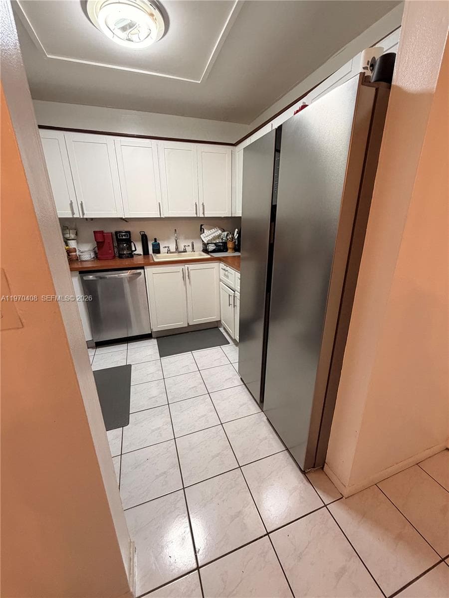 WOODSIDE APTS CONDO · #B304 in North Miami Beach - Photo 11