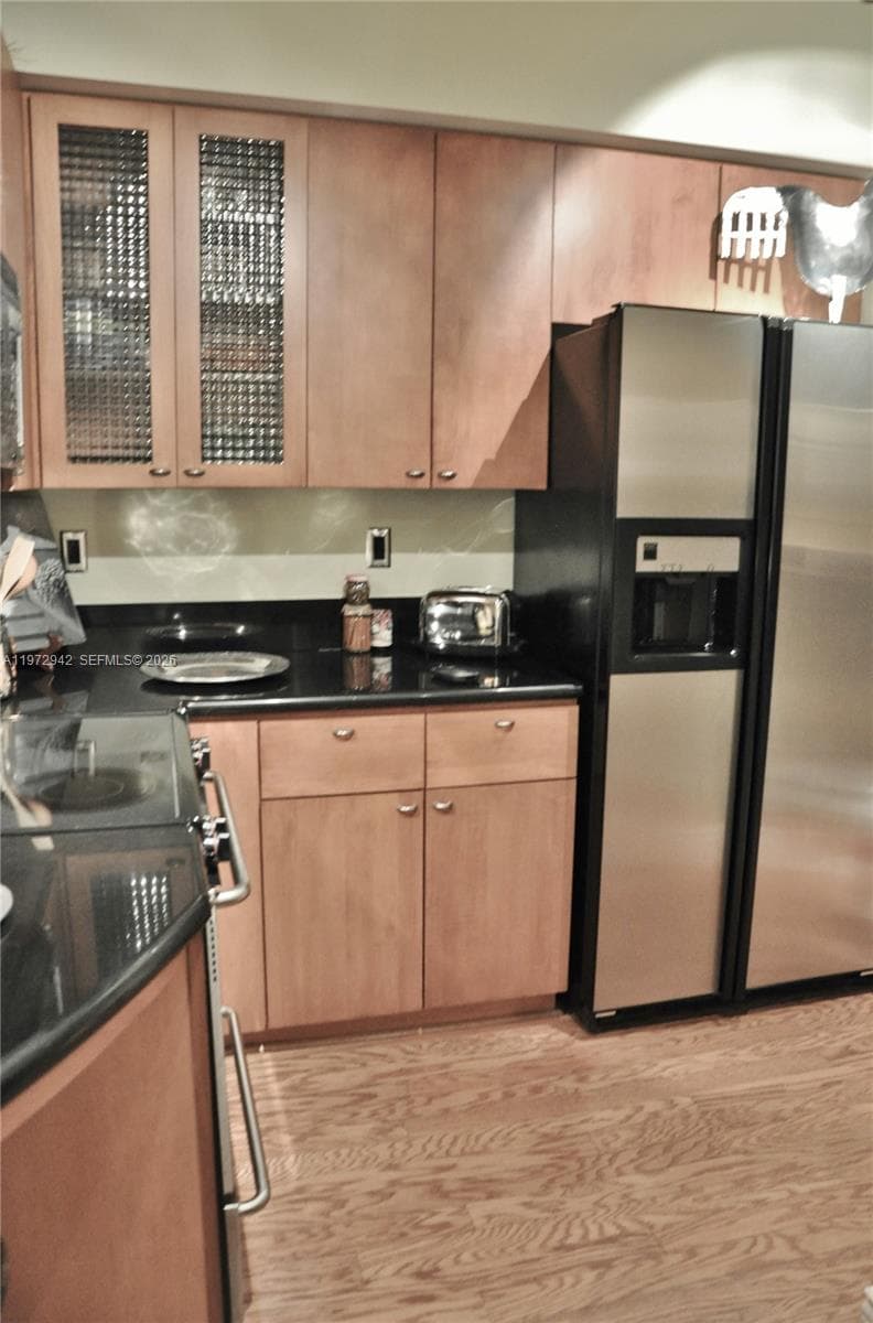 Maple Cabinets with Vintage Glass Inserts