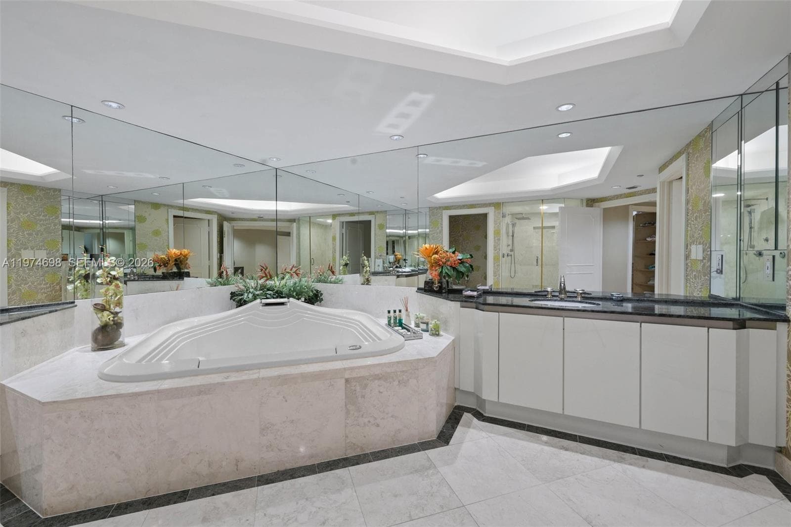 Spacious 7-piece Primary Ensuite with soaking Tub, Separate shower with steam & Dual vanities