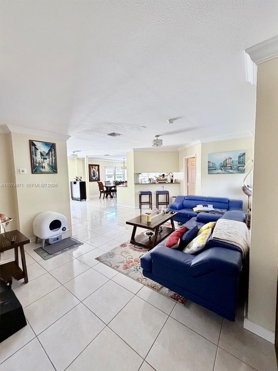 First floor open concept family room, kitchen, and dining room