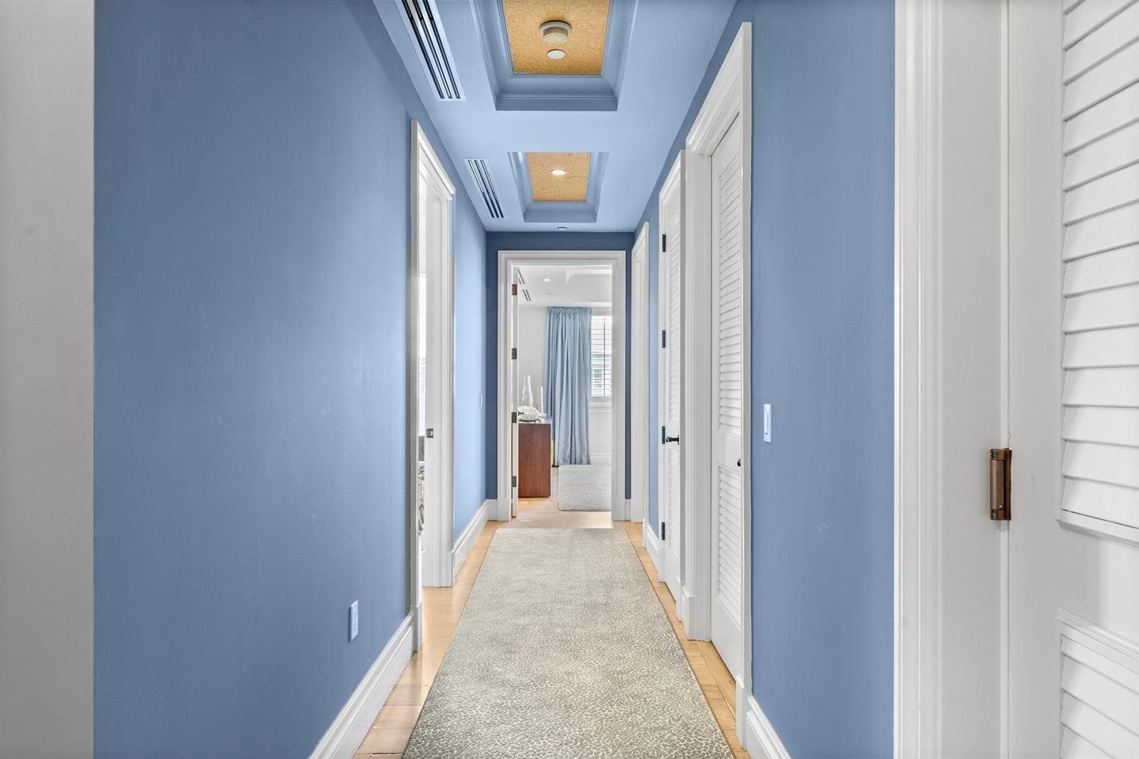 Hall leading to guest bedrooms