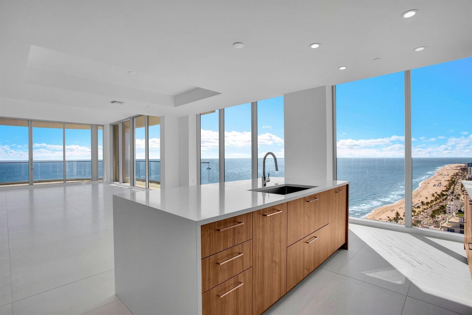 Island, dining, and living area
