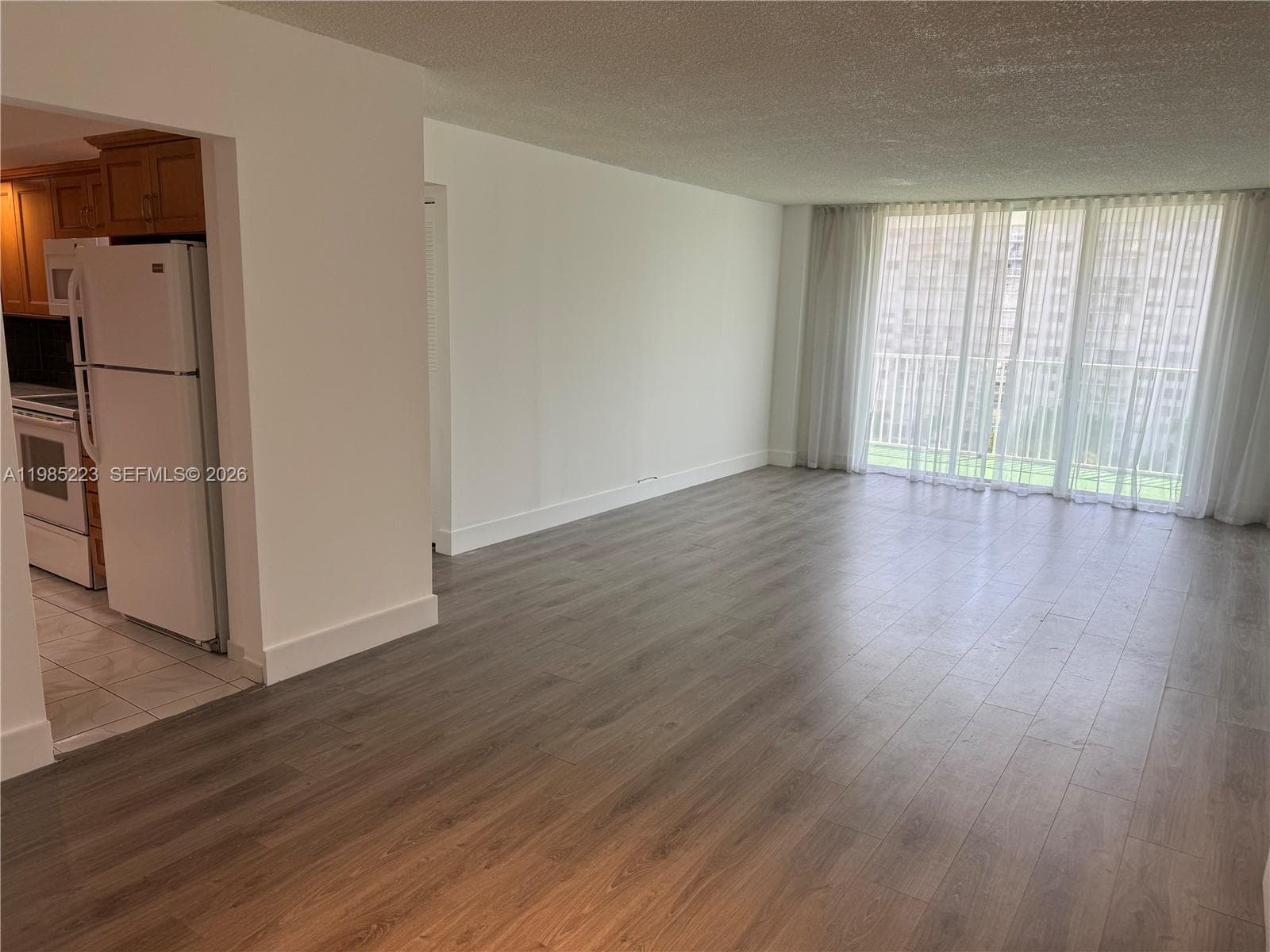 Laminate flooring throughout.