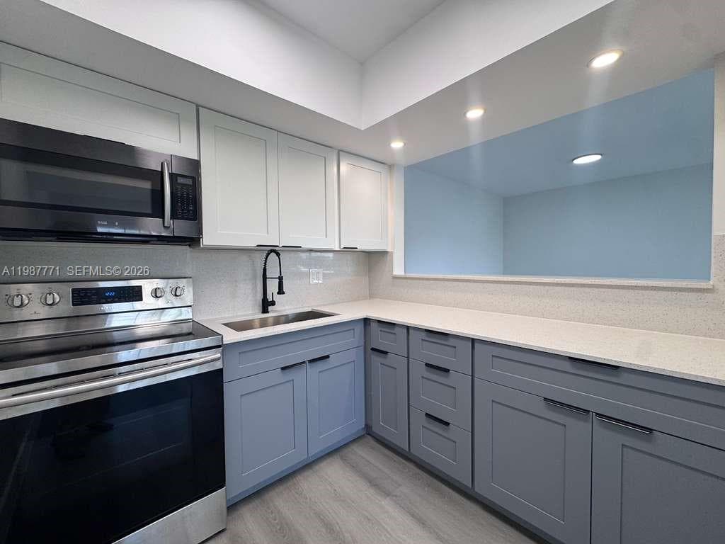 ENVOY APARTMENTS CONDOMIN · #203 in Hallandale Beach - Photo 4