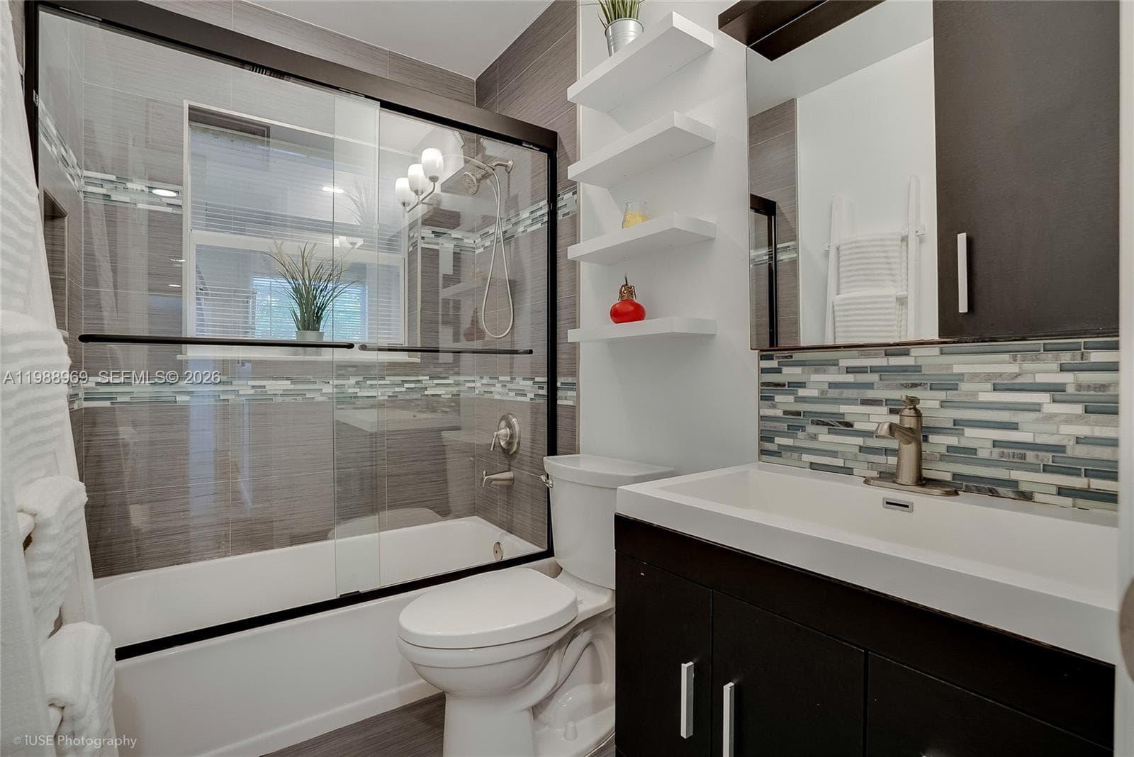 Guest bathroom has a tub