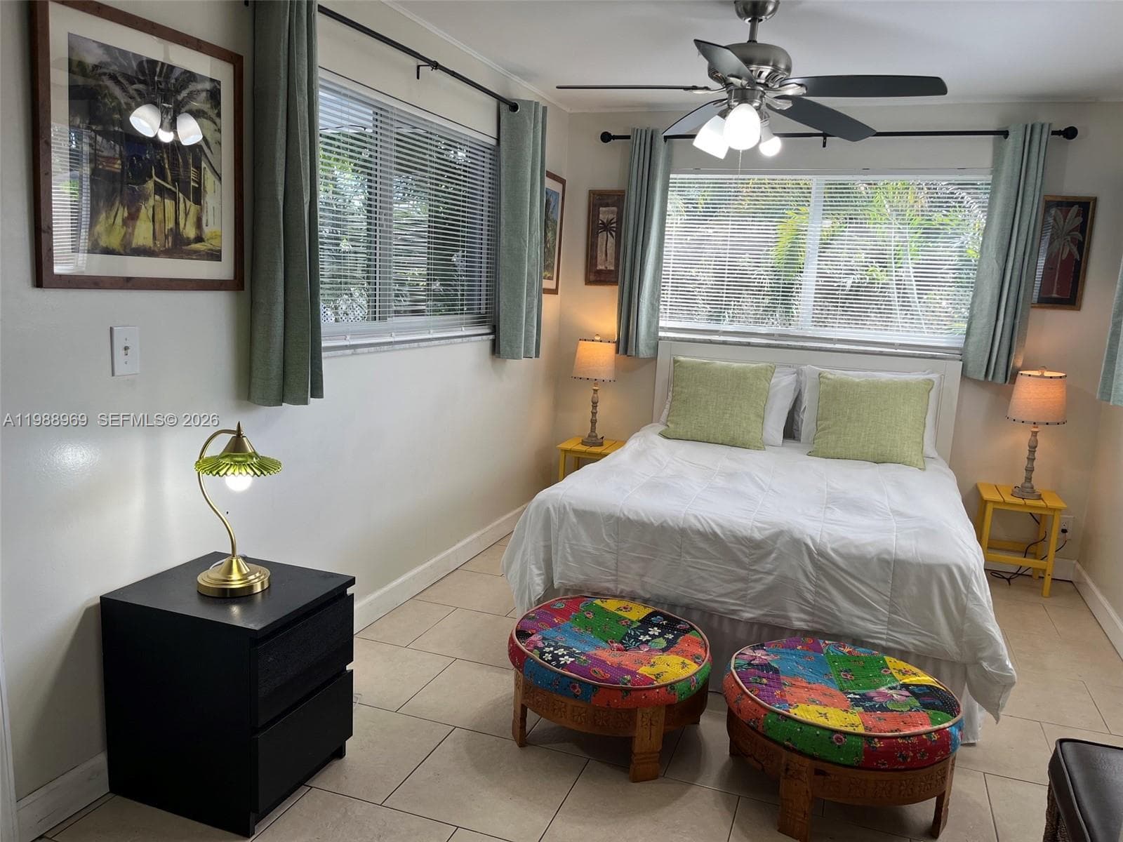 Corner Guest bedroom overlooking the backyard and private covered deck in separate wing with 2 queen size beds has been changed to a 1 queen bed.