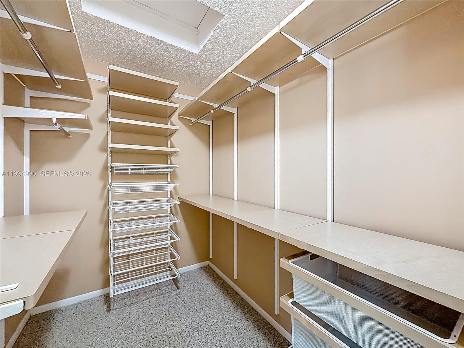 master walk-in closet by Container Store