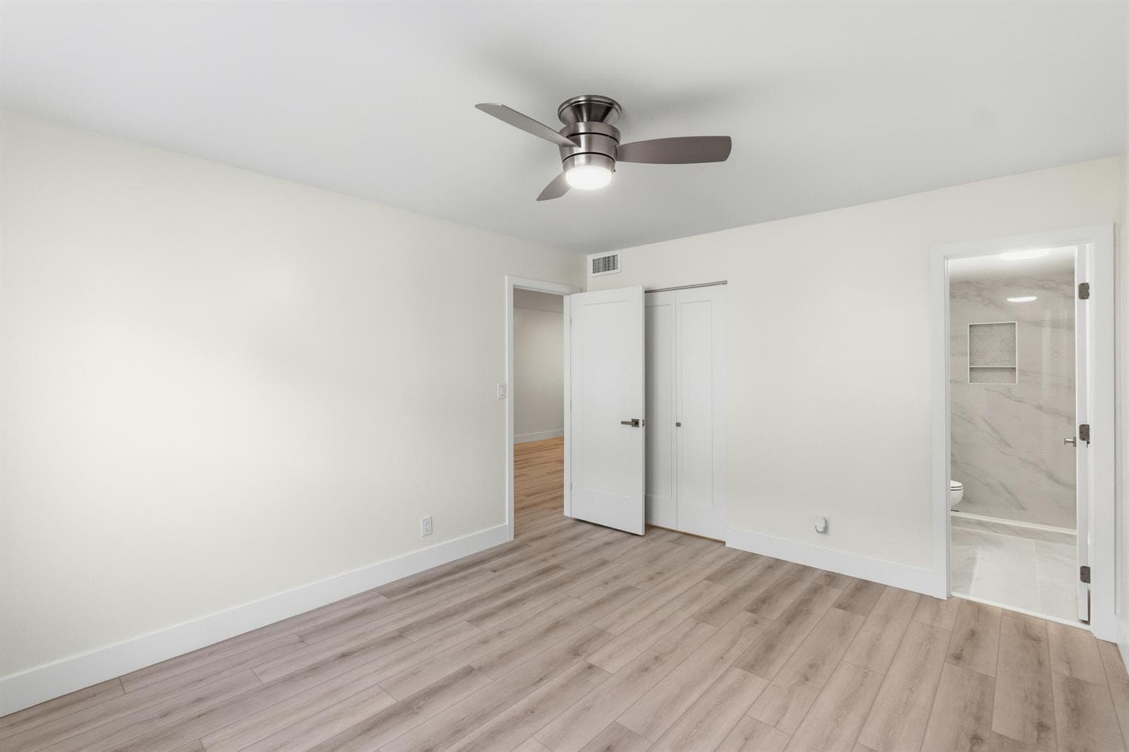 PRIMARY BEDROOM WITH ENSUITE