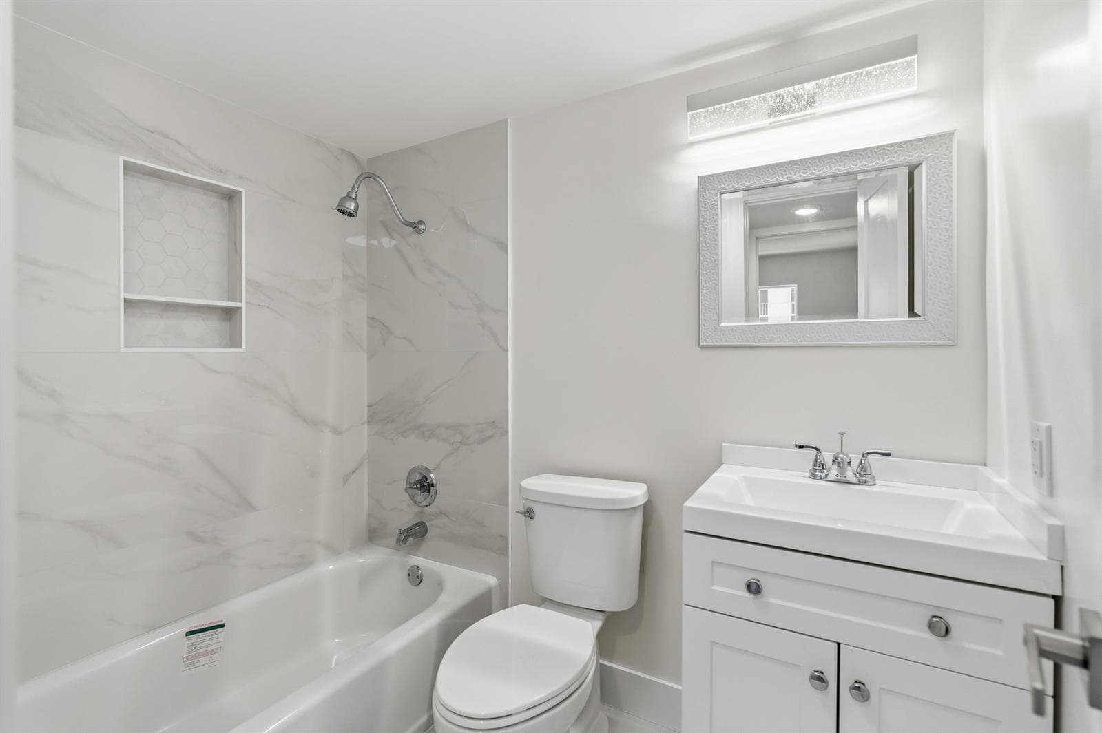PRIMARY BEDROOM WITH ENSUITE