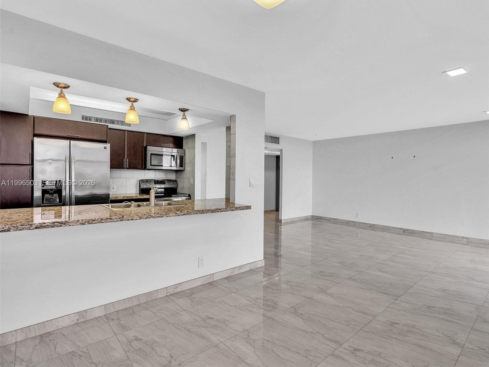 Updated Kitchen with breakfast bar and open layout