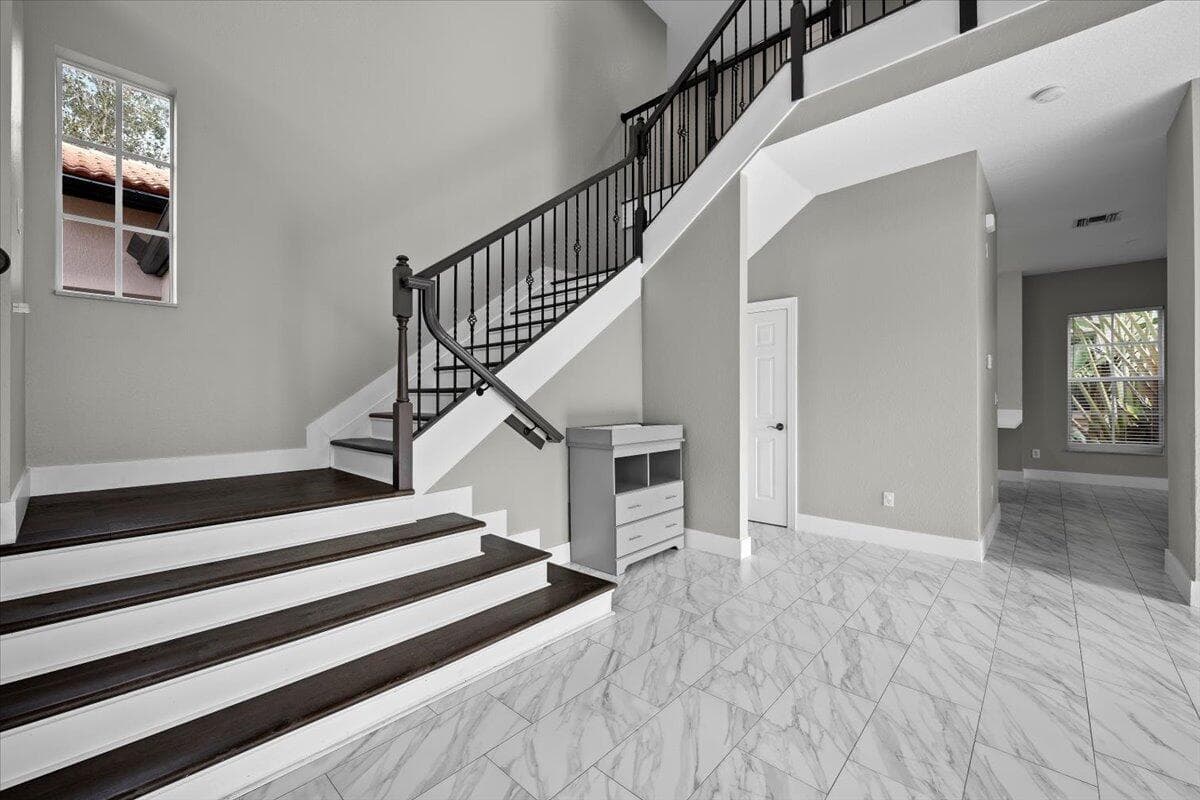 Grand Staircase to Bedroom Area