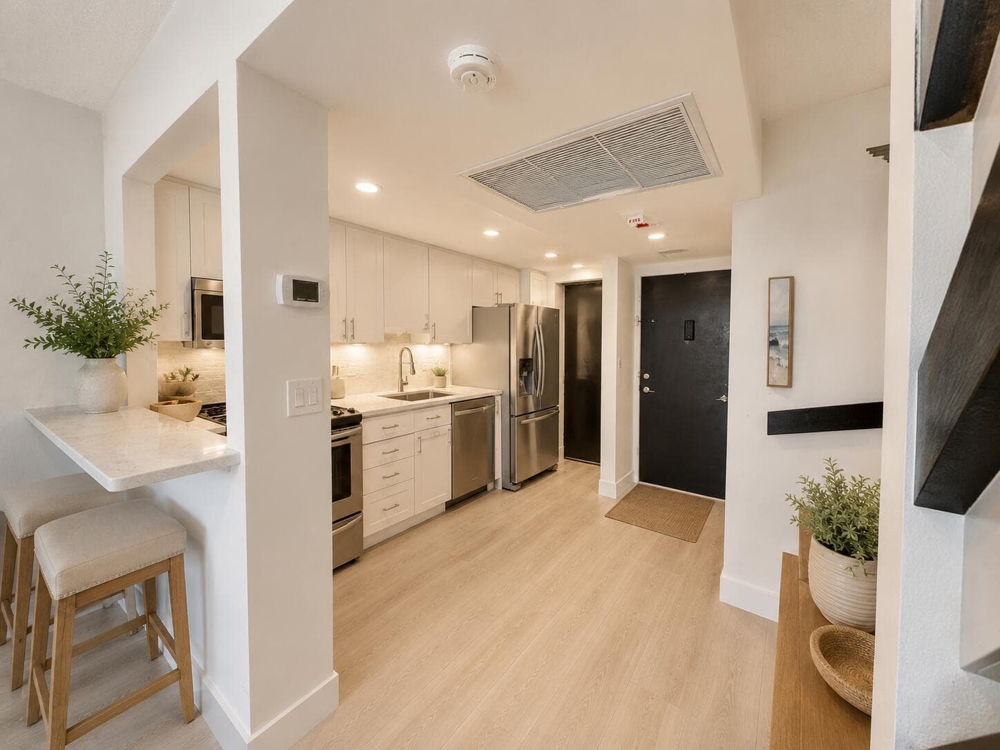 STAGED KITCHEN AND DINING AREA TOWNHOUSE