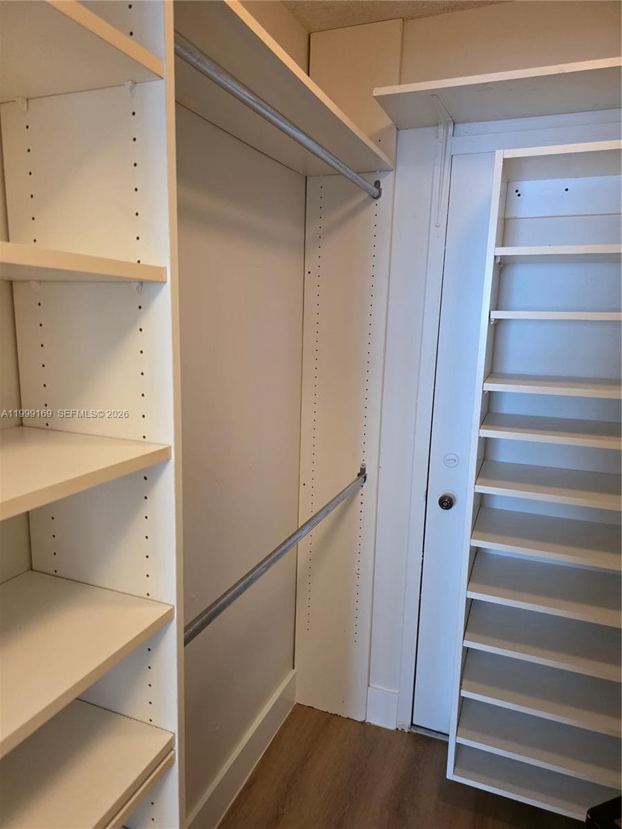CUSTOM CLOSET IN MASTER