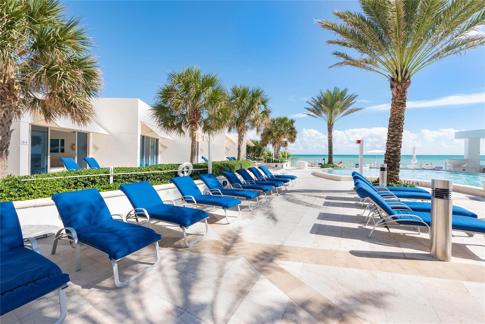 chaises by the pool