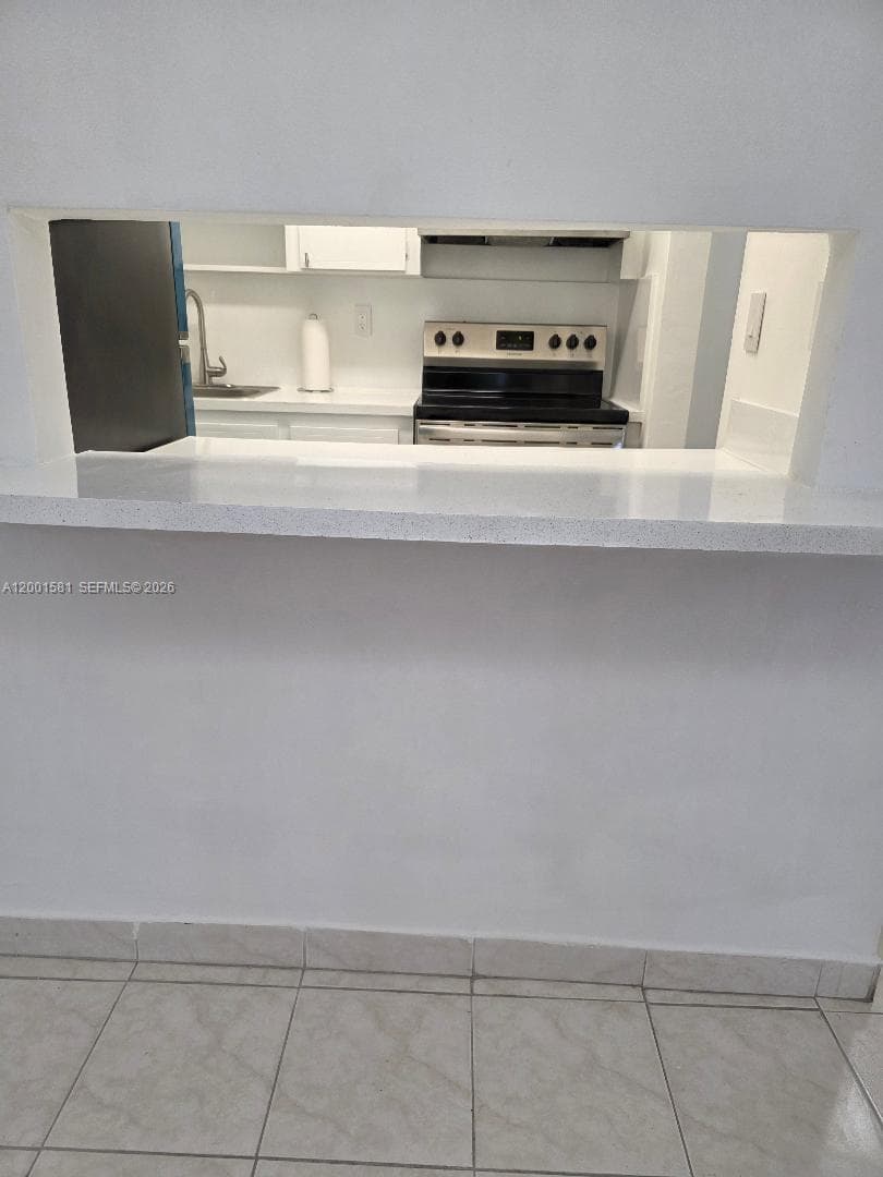 PASS THRU WINDOW FROM KITCHEN TO DINING AREA