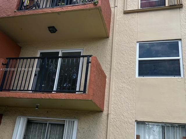 OPEN BALCONY WITH INPACT SLIDING DOORS