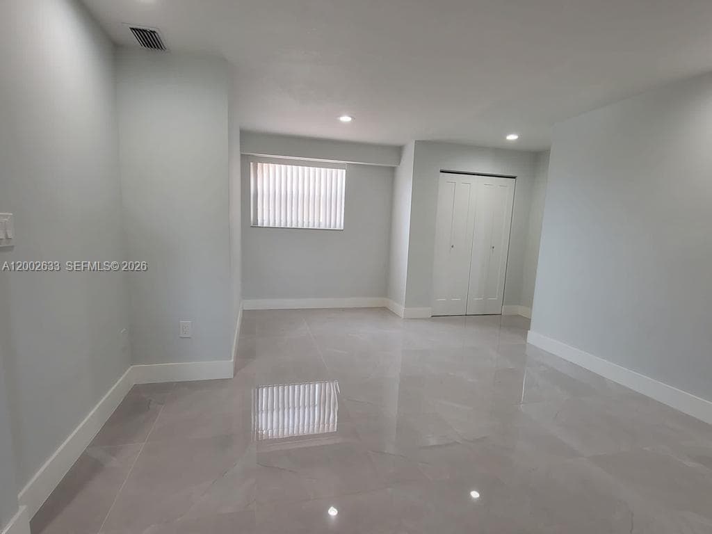 Huge living room with recessed lighting