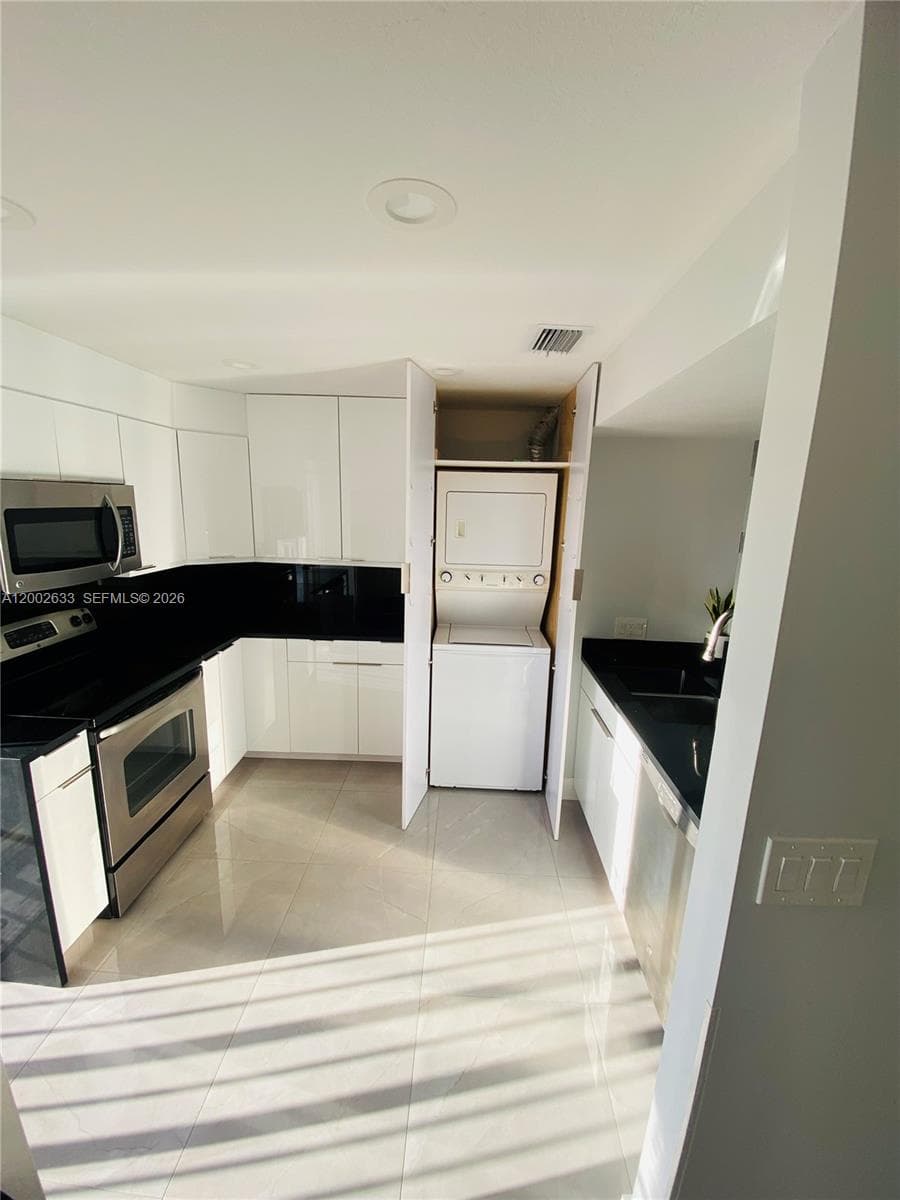 Balcony right off of the kitchen.