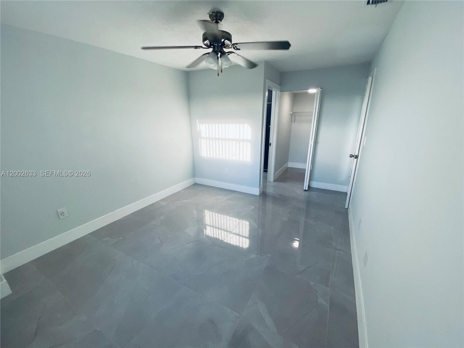 Huge living room with entry way closet