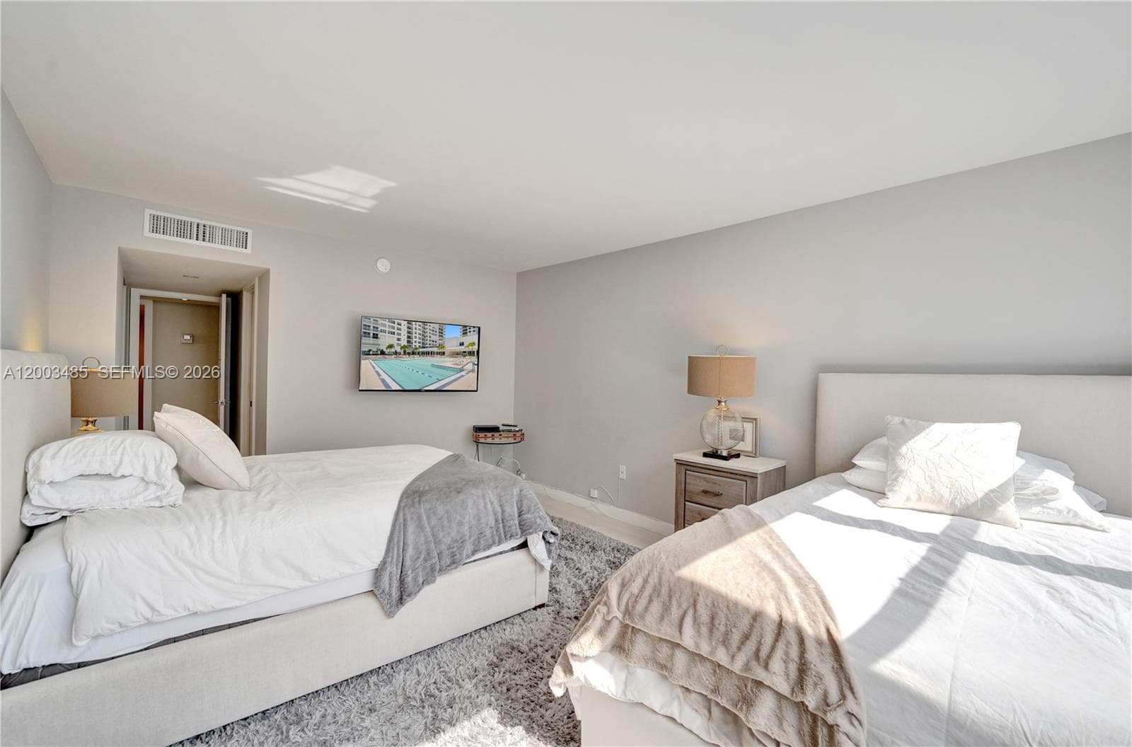 oversized bedroom accommodates 2 beds