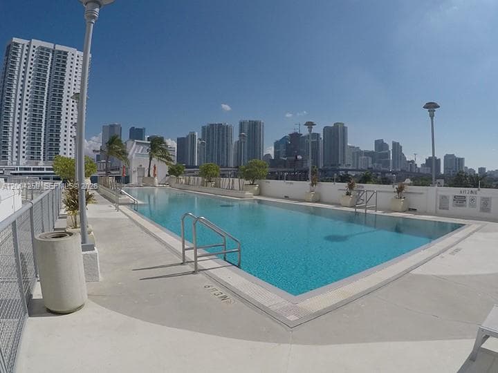 Large Infinity Pool with City Views