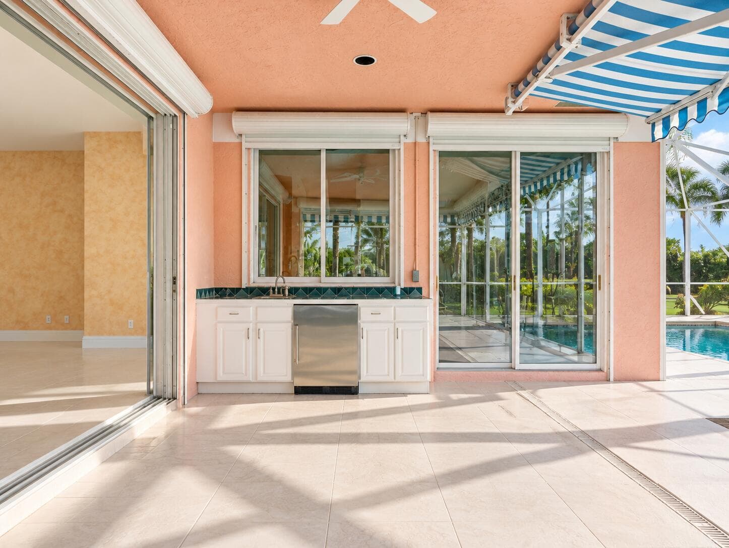 Sunlit Tropical Lanai with Wet Bar