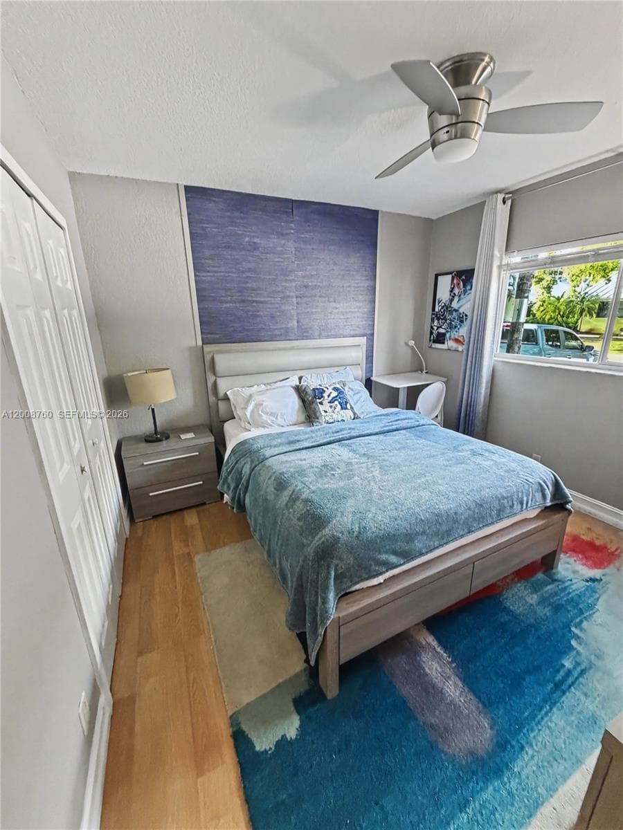 Second bedroom — bright and comfortable with ample closet space