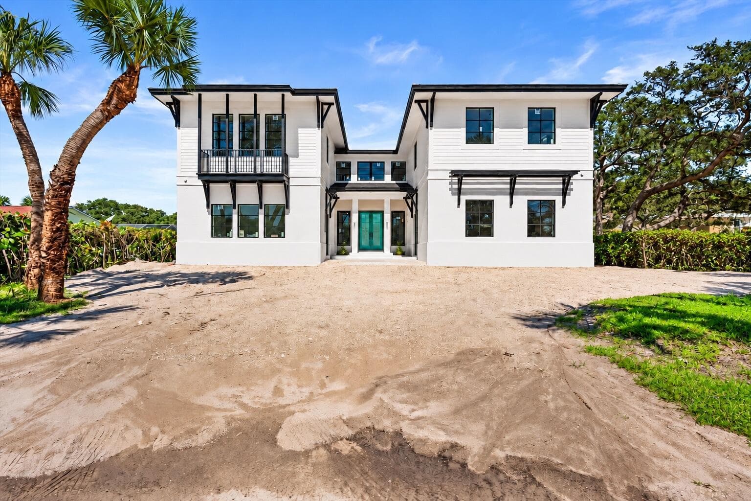 Modern Coastal Home with Turquoise Entry
