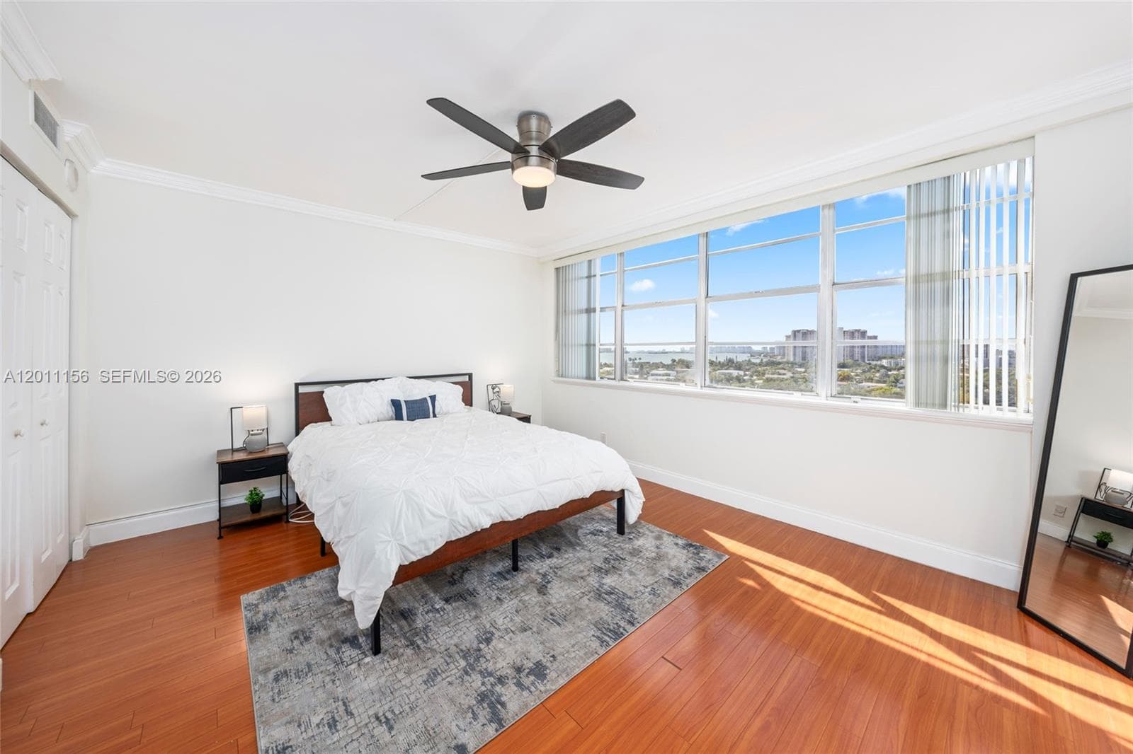 Bedroom with water views & city Views