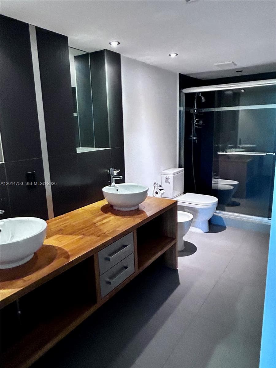 Master Bath w/ custom vanity, bidet and shower.