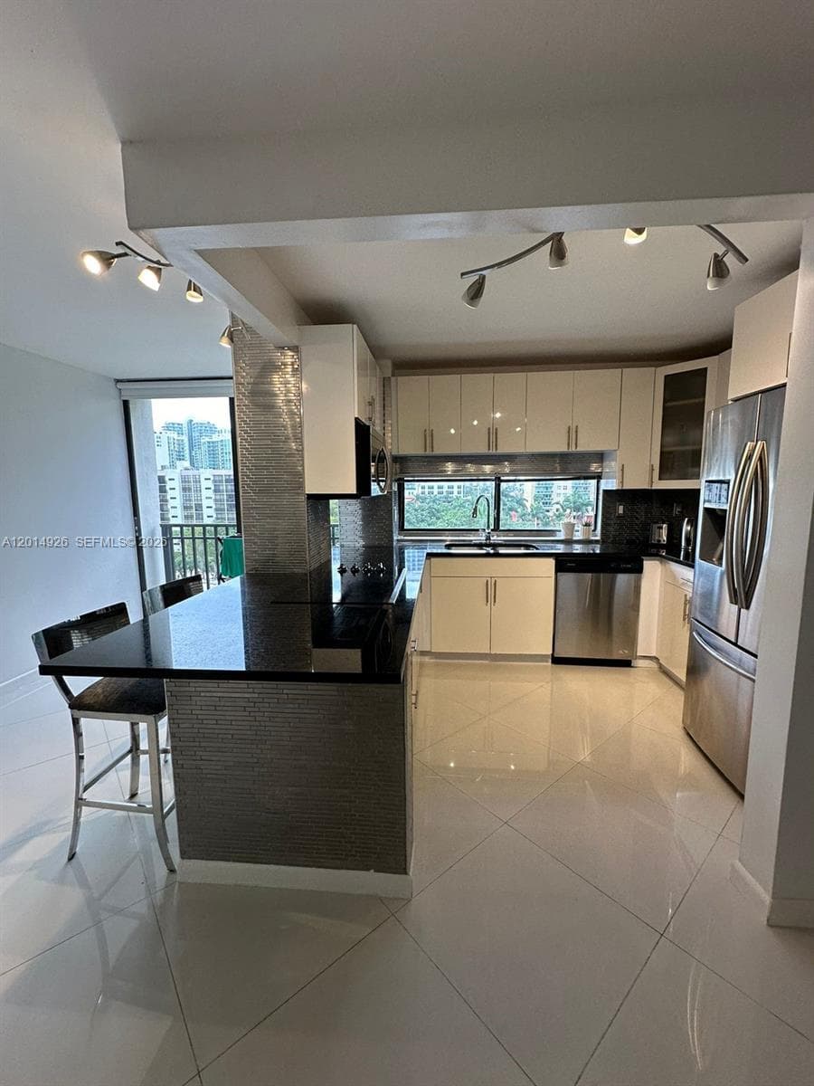 PLAZA OF AMERICAS CONDO P · #815 in Sunny Isles Beach - Photo 1
