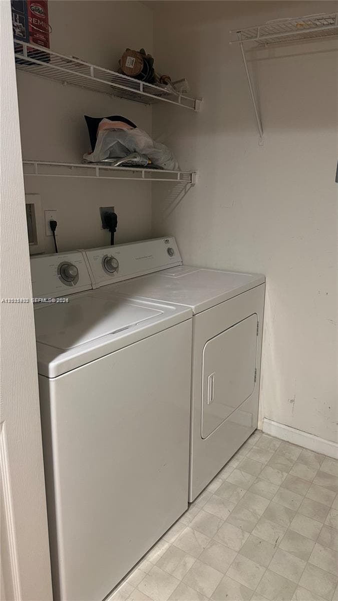 Laundry room with full capacity washer and dryer !