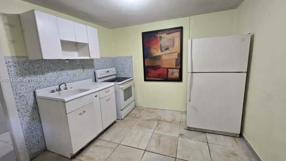 701 Tamiami Canal Rd photo 38